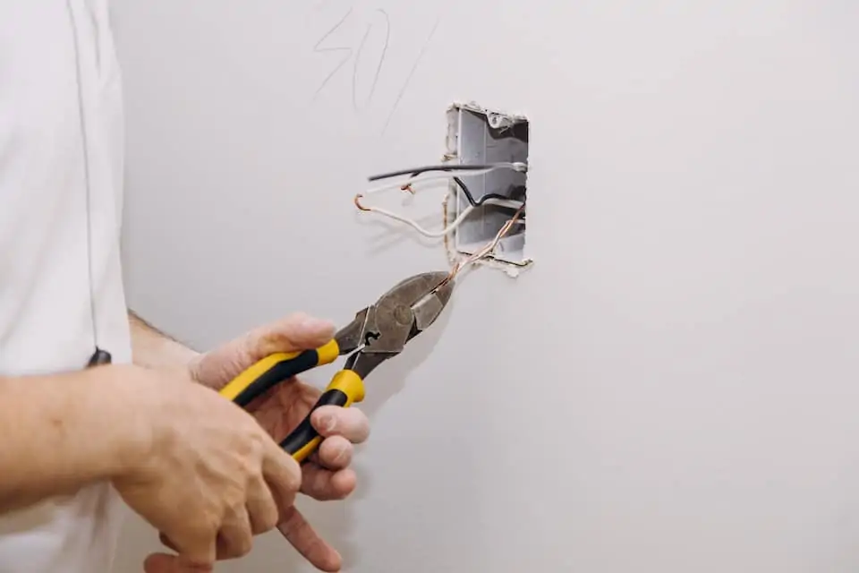 New electrical installation, socket box, switch electrical outlets connector installed in plasterboard drywall for gypsum walls; how to add an electrical outlet
