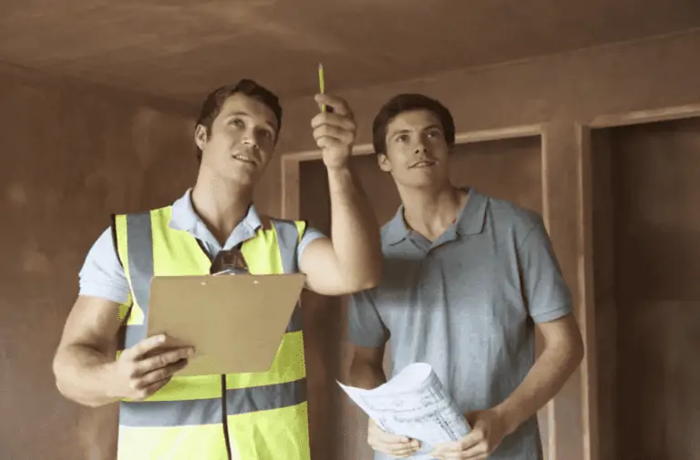 two men conducting home electrical inspections