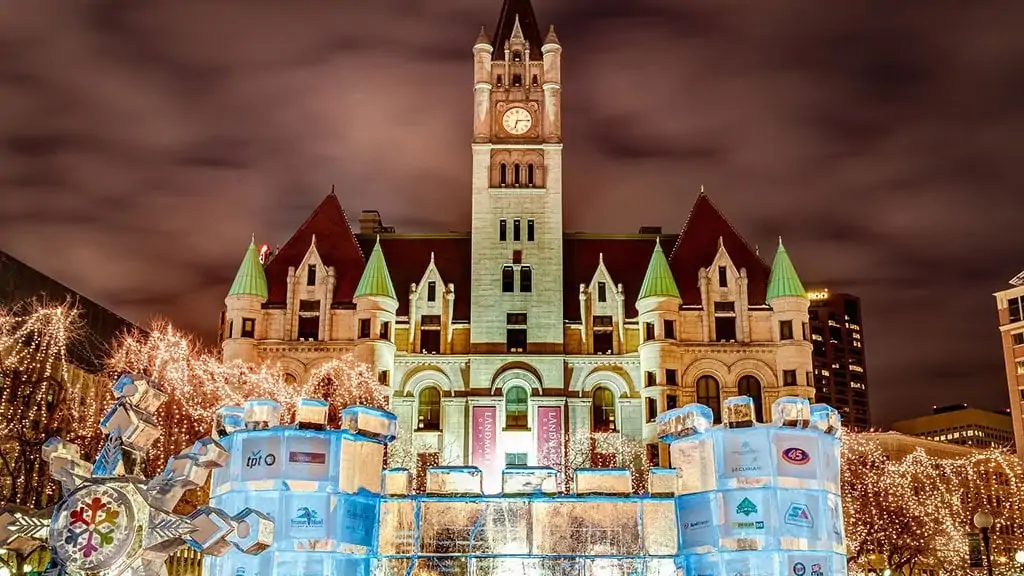 shot of ice castle at st paul winter carnival; history of st. paul