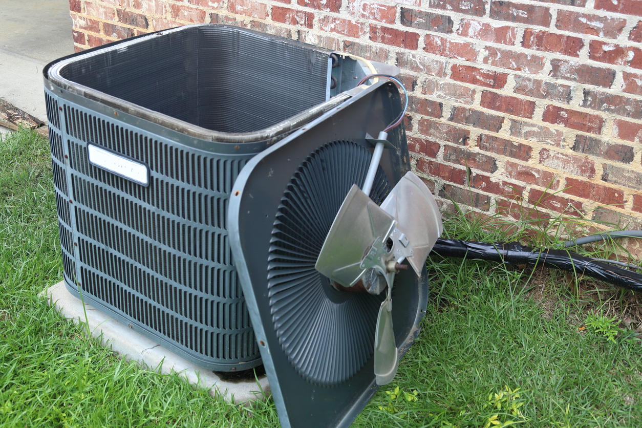 HVAC condenser unit with fan removed for service