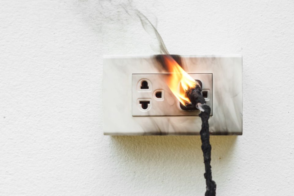 Melted power cable plugged into wall outlet on fire from short circuit; how to prevent an electrical fire