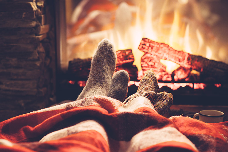 cute socks cozied up by the fire