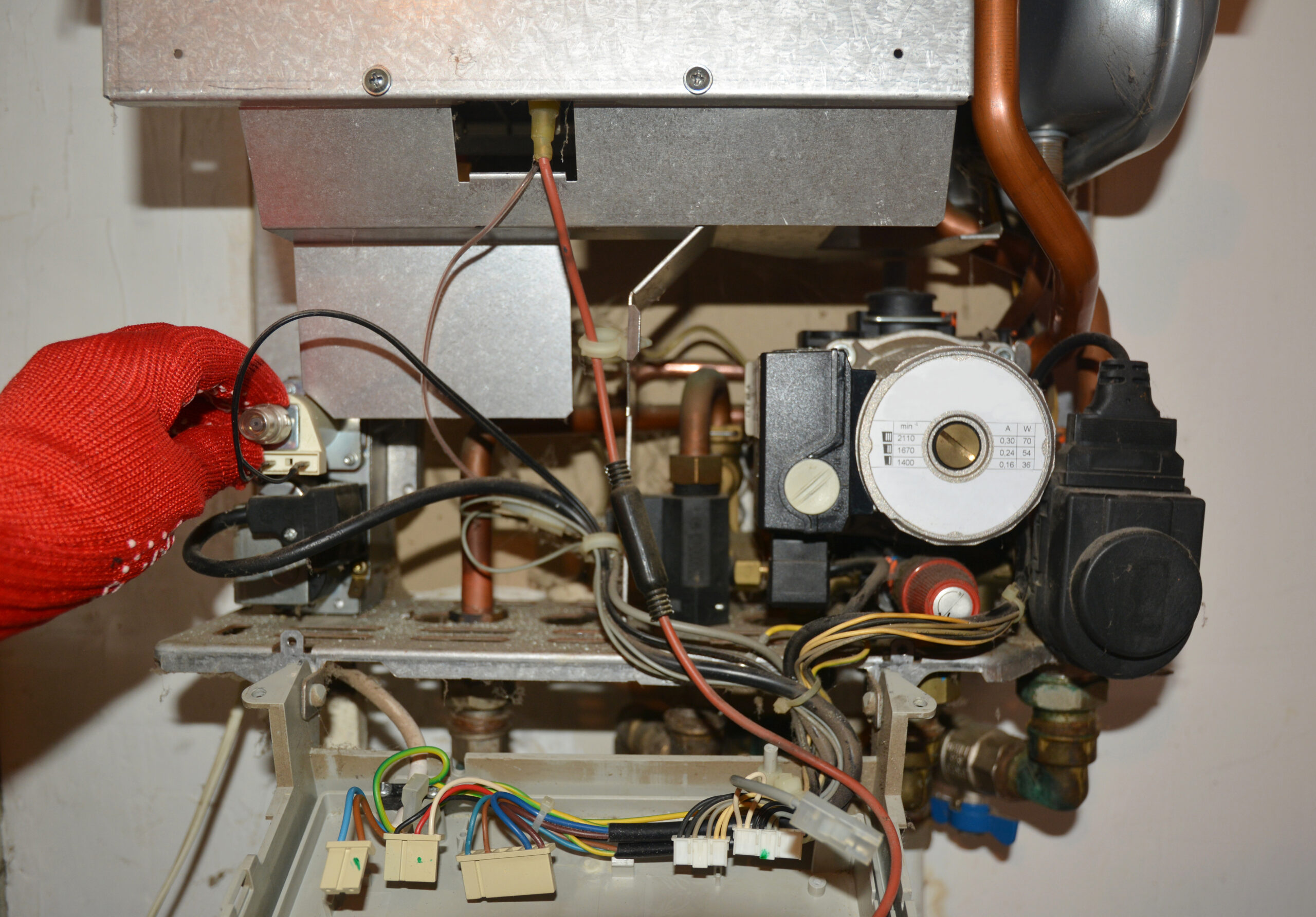 Boiler with wiring being worked on