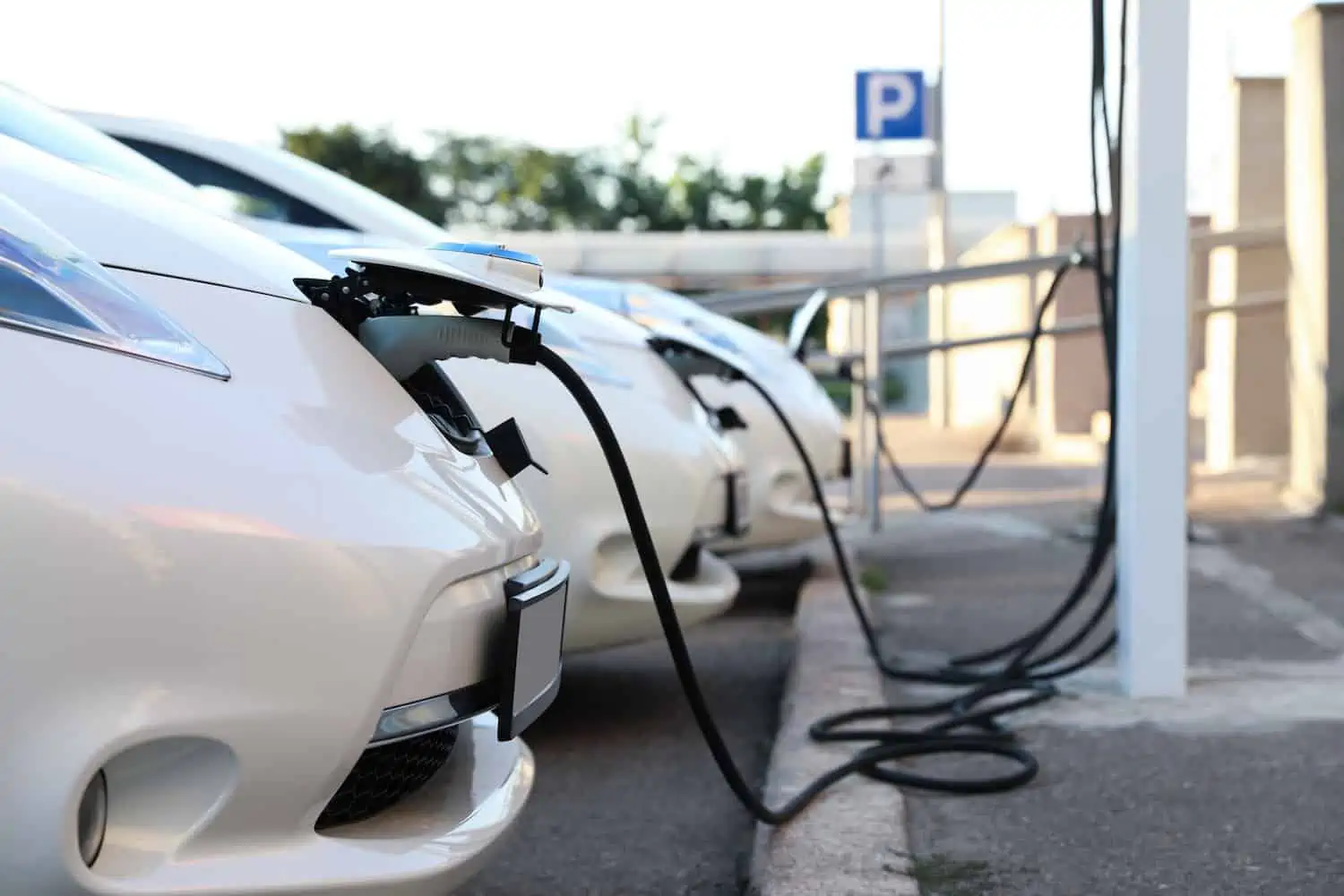 ev charging cables for public use plugged into electric vehicles