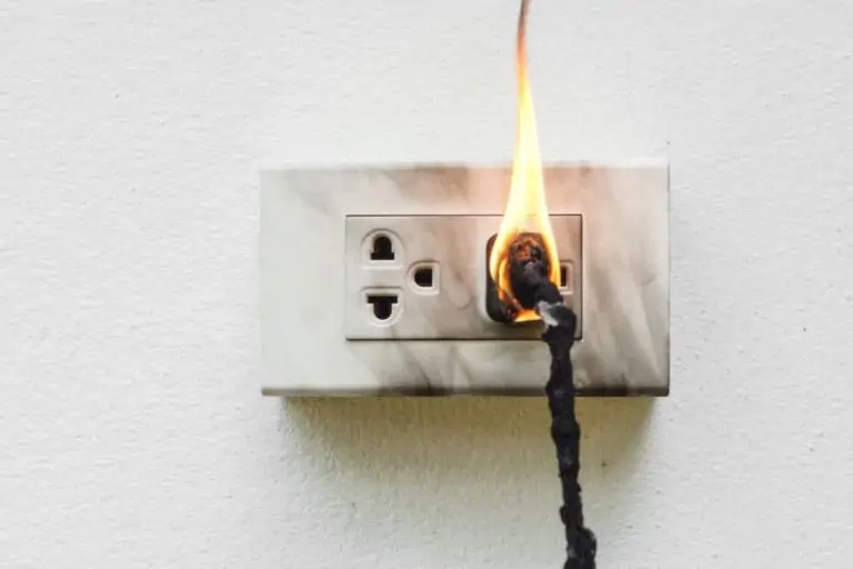 cord plugged into electrical outlet thats on fire; home electrical inspections