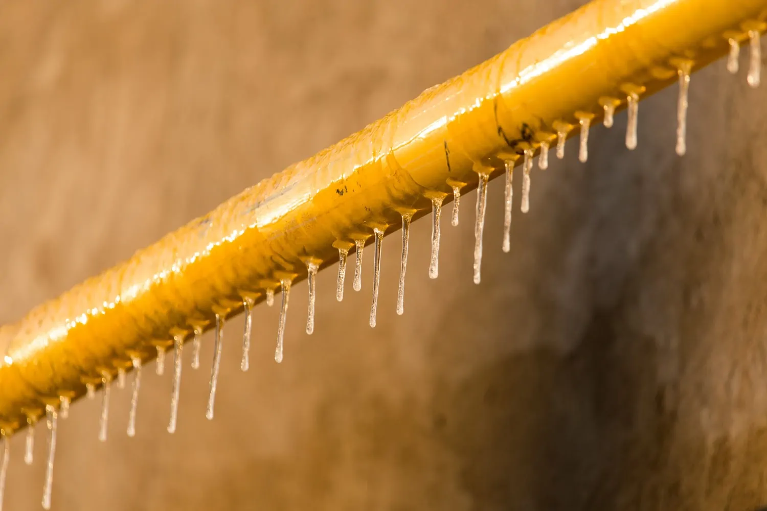 frozen pipes with icicles