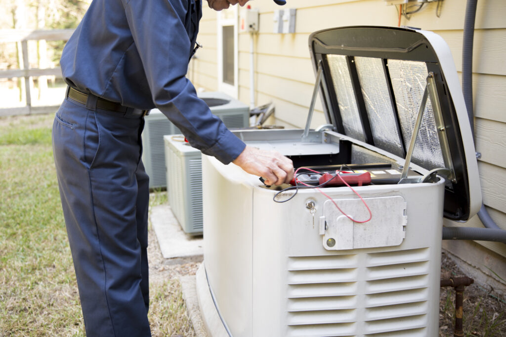 Electrician installing residential whole home generator